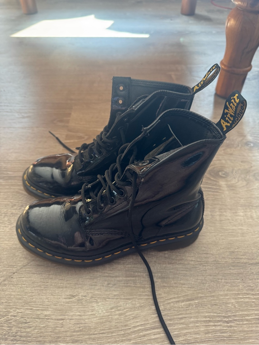 Dr. Martens Black Patent 8-Eye Lace-Up Boots with Yellow Stitching